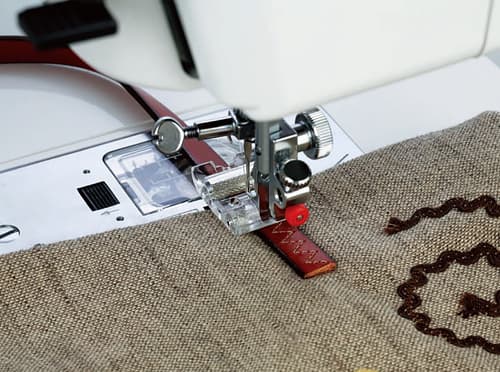 Лапка роликовая для машин с горизонтальным челноком